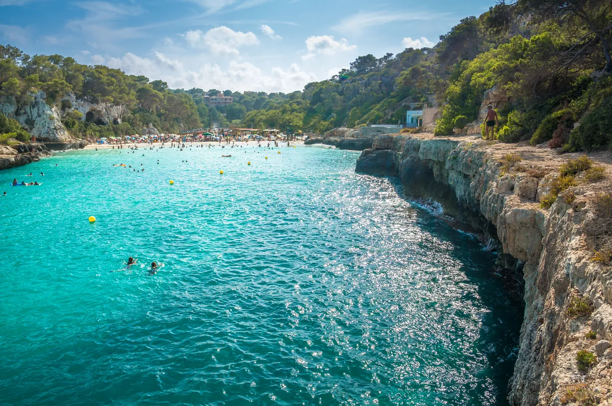 Path and beach at Cala Llombards